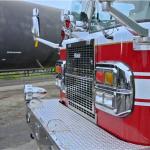 a fire truck near a train car