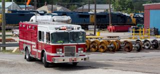 a fire truck near a railroad yard